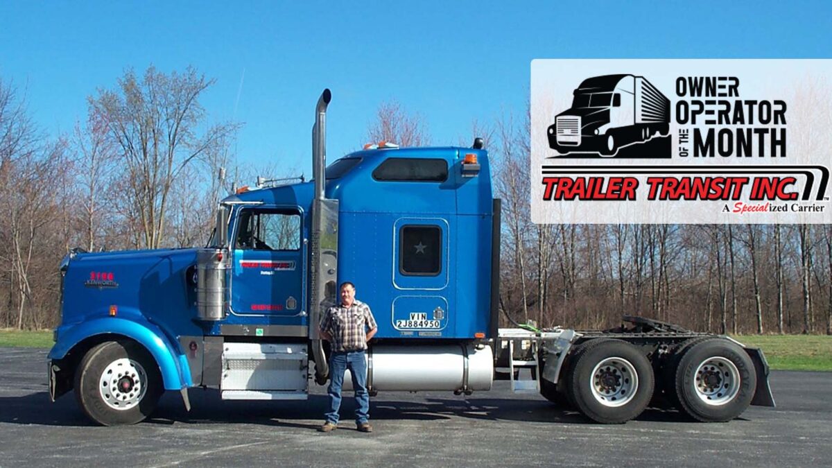 Trailer Transit, Inc. Owner Operator of the Month, Bill - September 2021 standing in front of his Blue Truck