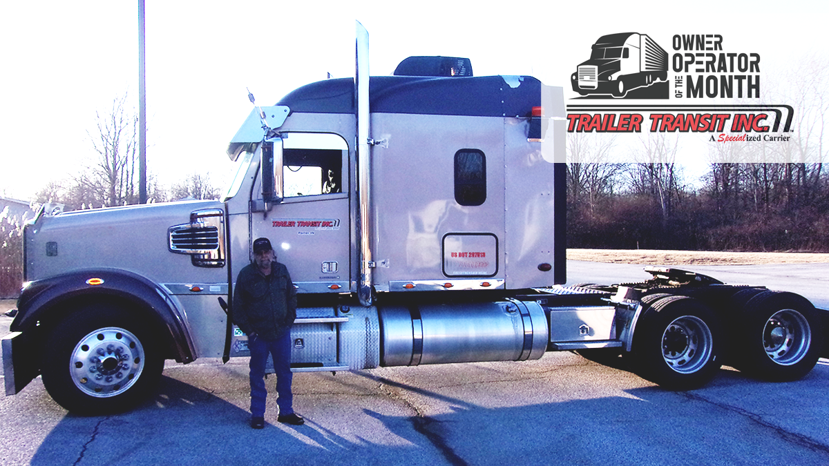 Trailer Transit Inc. | September Owner Operator of the Month, Richard, stands beside his rig.